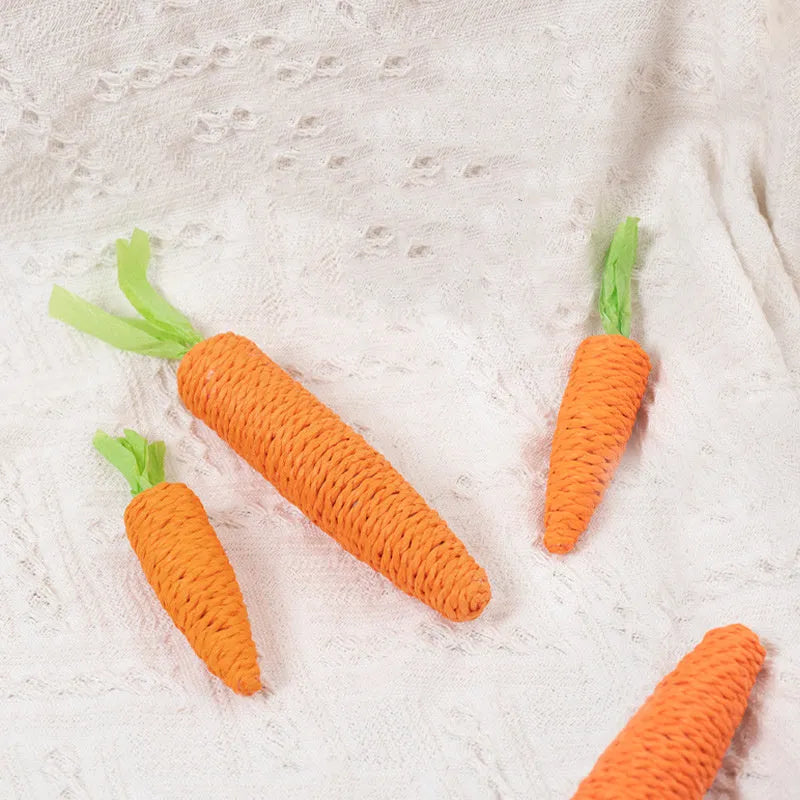 Set of interactive cat toys including carrot bites, paper toys with stones, and grinding sticks in S and L sizes