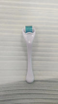 540 micro needle mechanical derma roller with black handle and coloured wheel options