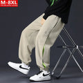 Men's cotton pants with ankle banded design and stitching details in black colour