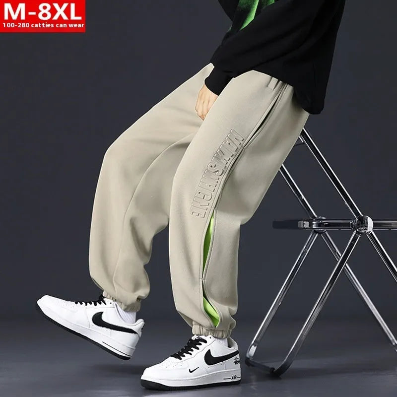 Men's cotton pants with ankle banded design and stitching details in black colour