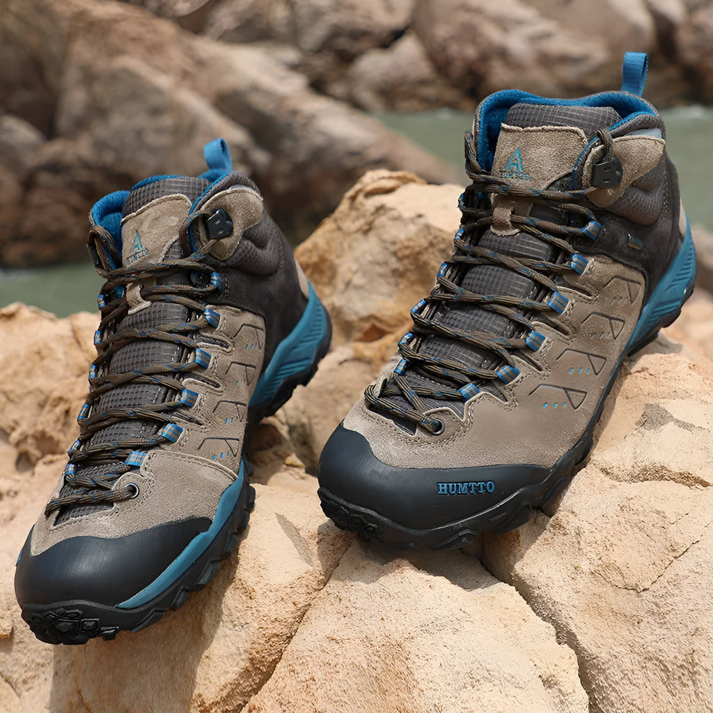Men's black low top lightweight hiking shoes with EVA outsole and rubber sole on outdoor trail