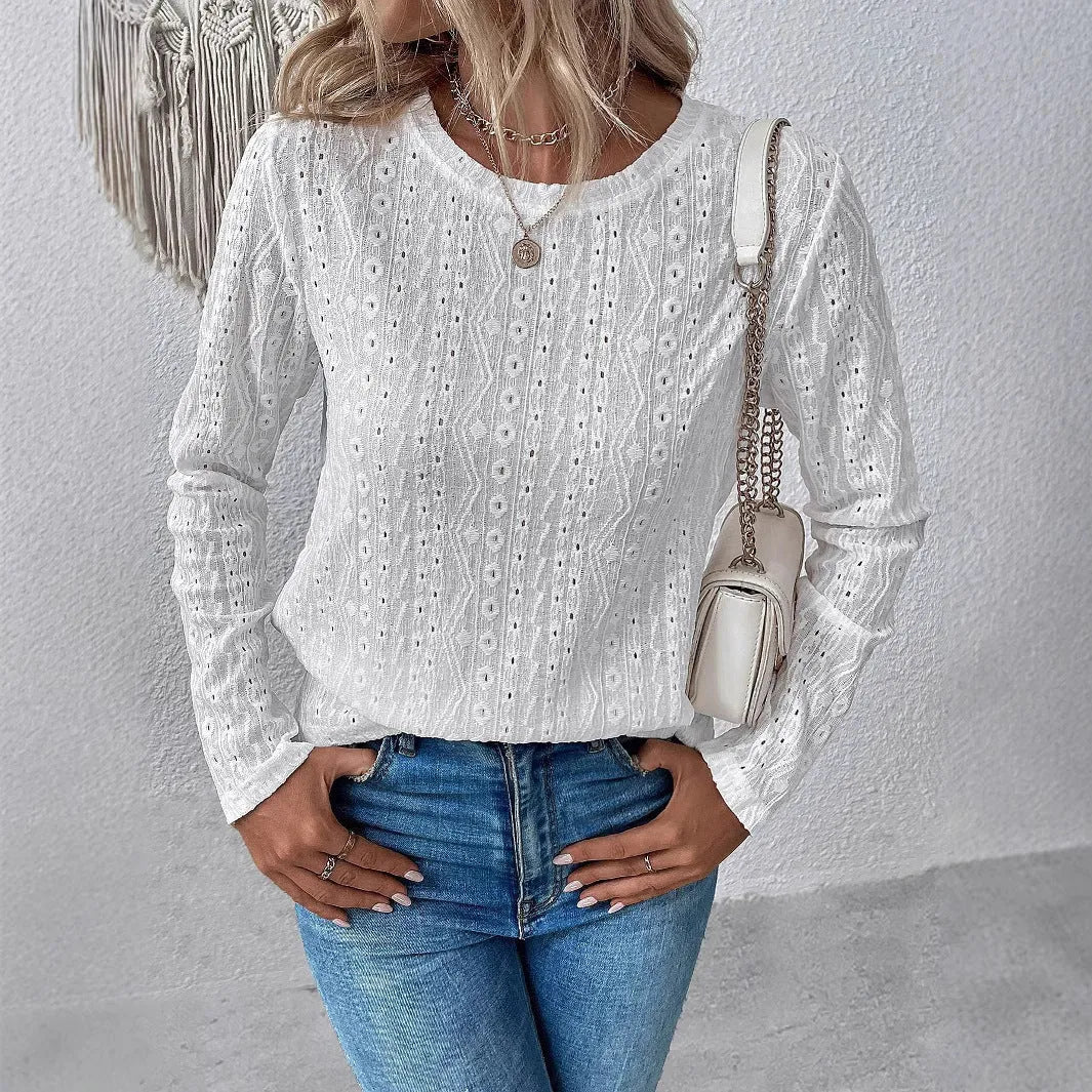 White women's long sleeve t-shirt with round neck and loose fit design