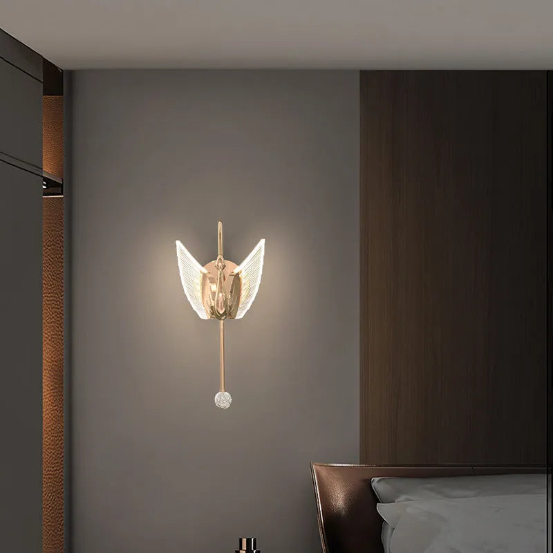 Gold minimalist swan silhouette wall lamp with acrylic shade and dimmable LED light.