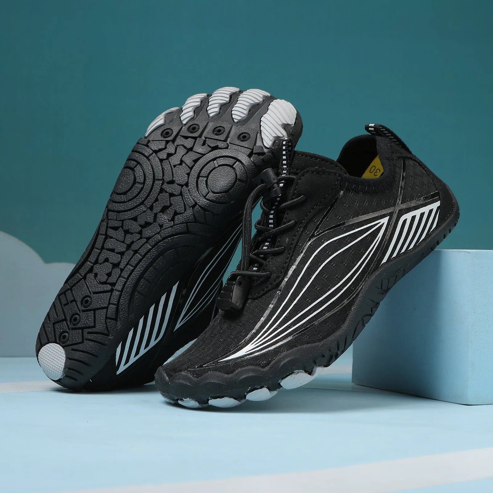 Children's black quick-dry water shoes with elastic band and rubber sole for outdoor swimming.