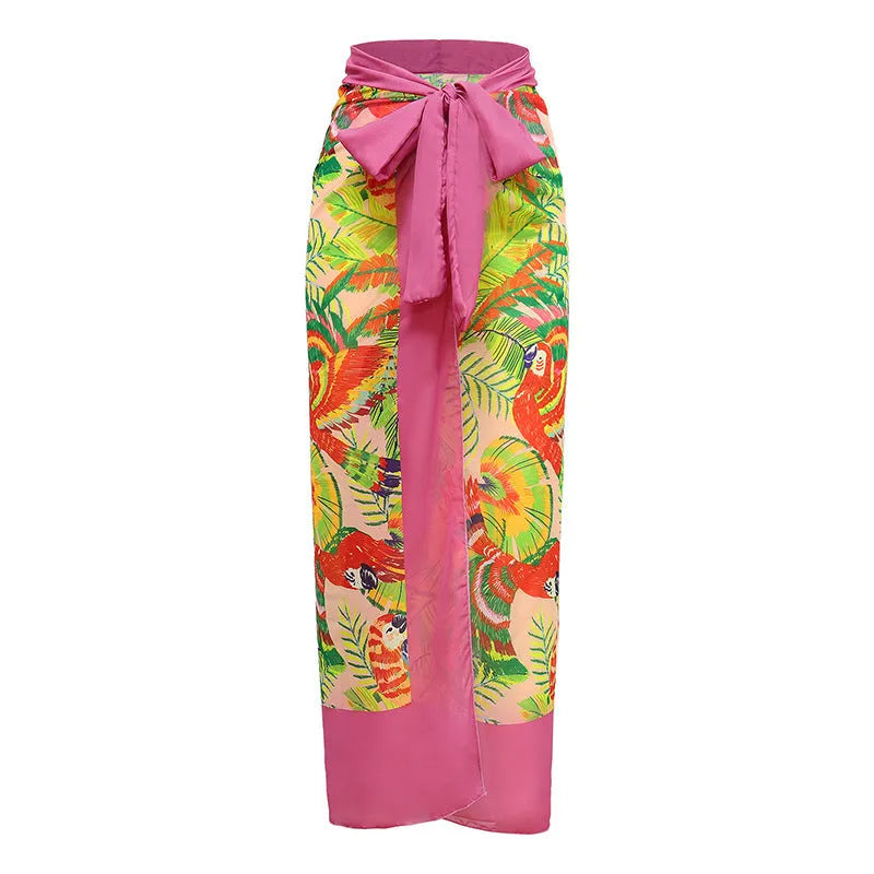 Retro pink floral print one-piece swimsuit with V-neck, covered belly and thin skirt overlay