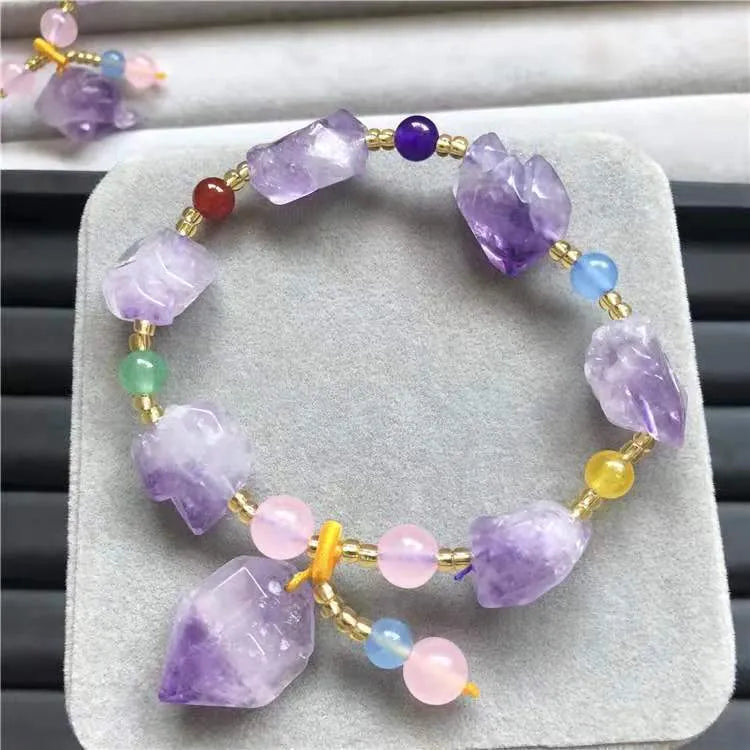 Women's natural amethyst bracelet featuring a Fu character bead and amethyst-shaped beads.