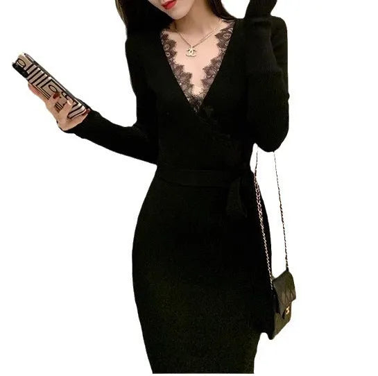 Black women's slim fit woolen skirt with a princess dress silhouette on a hanger.