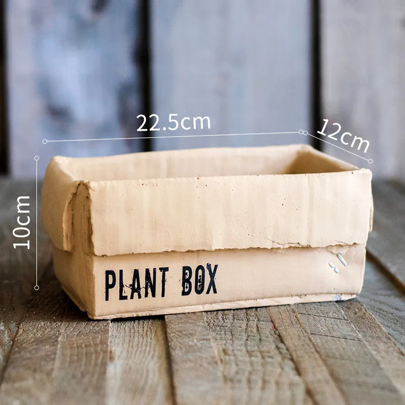 Cement brown paper box flowerpot with drainage holes for indoor planting