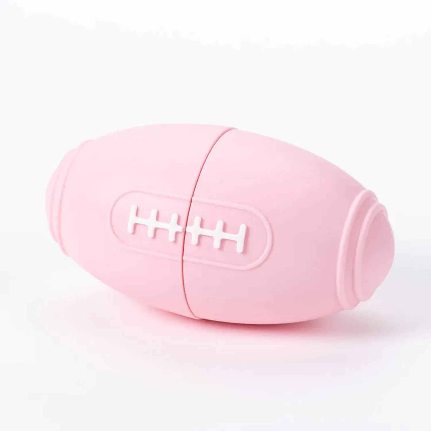 Blue silicone rugby ball dog toy with hollow treat-dispensing centre