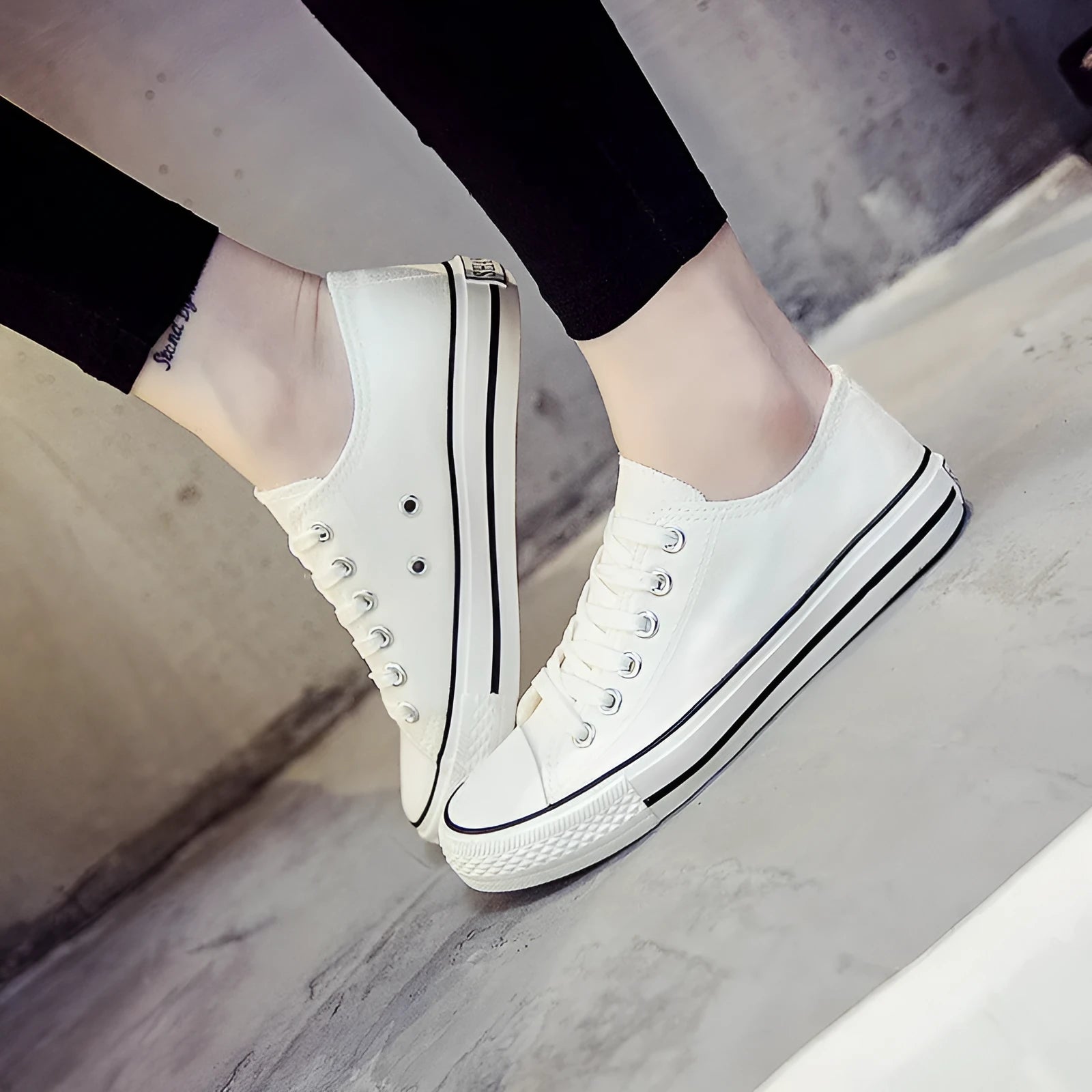 Women's casual canvas shoes in solid colours: all-black, black, white-black, and white-red.