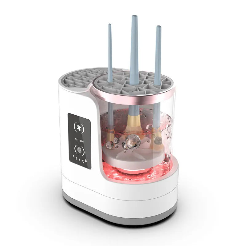 White rechargeable automatic makeup brush cleaner and dryer stand on a table