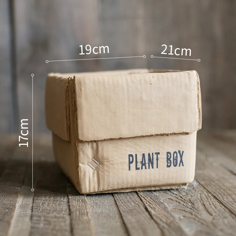Cement brown paper box flowerpot with drainage holes for indoor planting