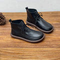 Women's cowhide boots in black and coffee colours with flat heel and round toe design