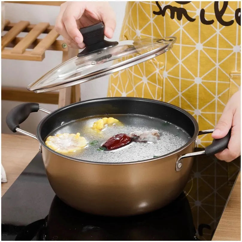 Three-piece cast iron cookware set with soup pot, milk pot and wok featuring non-stick coating