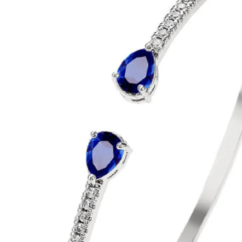 Multi-zircon personalised fashion bracelet with inlaid treatment on copper in blue and white options