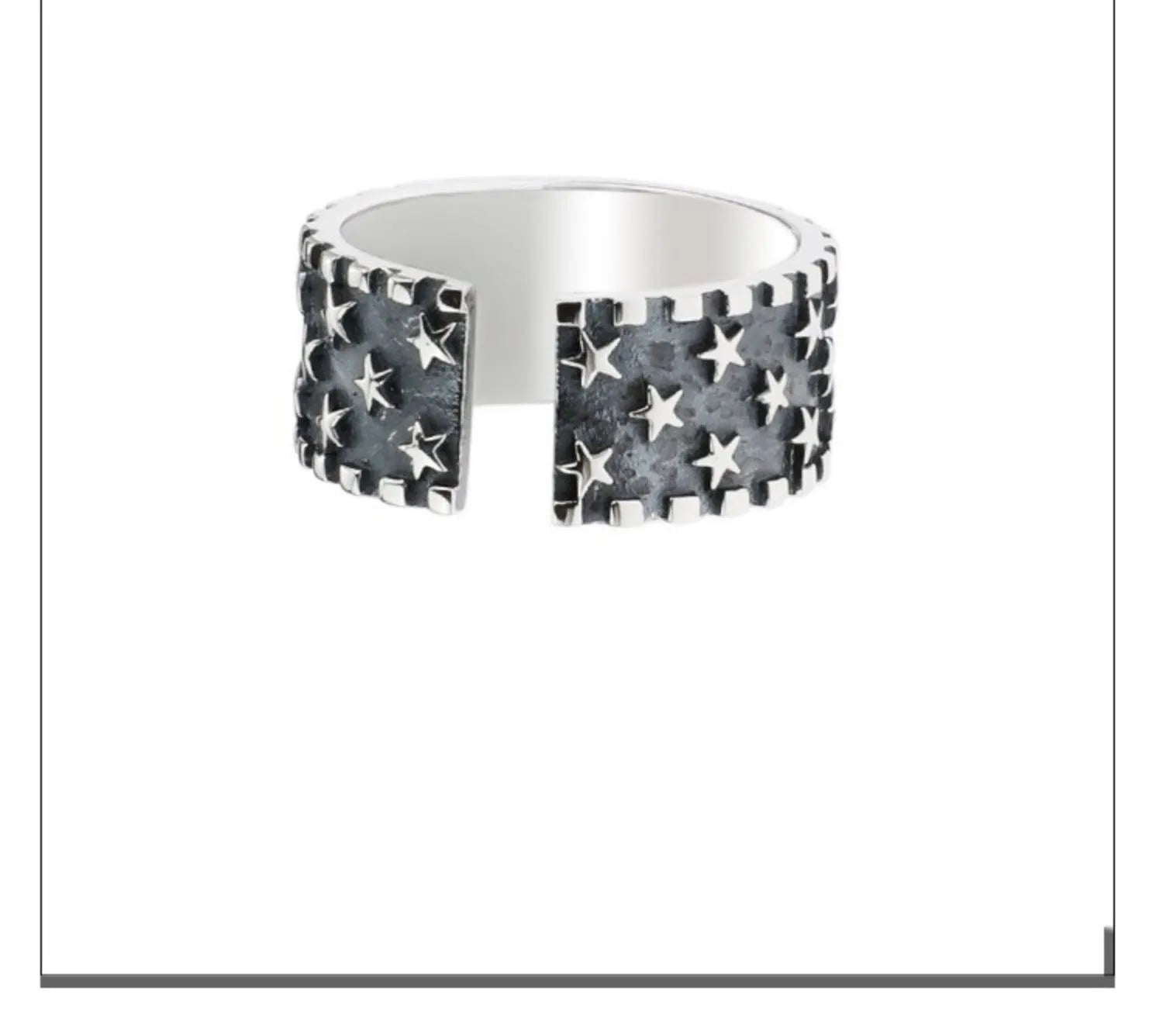 Adjustable silver ring with a geometric pattern of multiple five-pointed stars on the band.