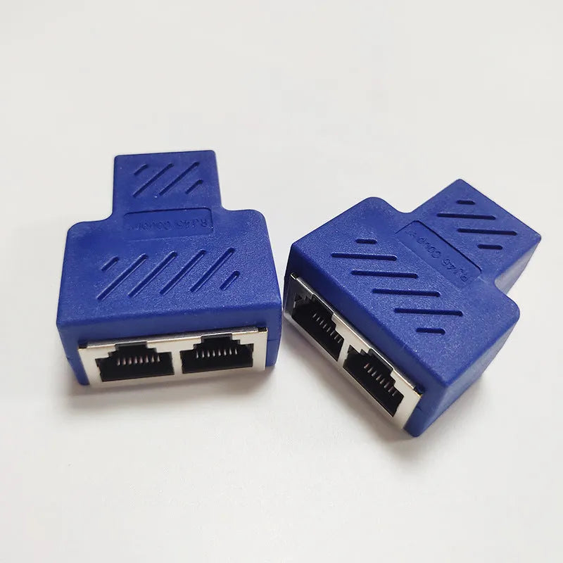 Two white RJ45 network cable splitter adapters showing one male and two female Ethernet ports.