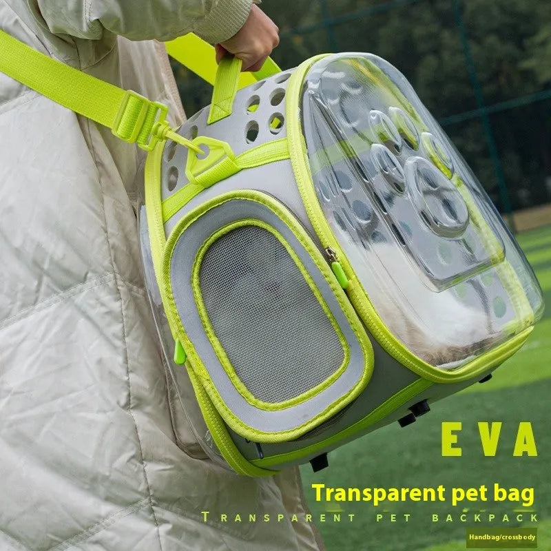 Large transparent hard EVA cat backpack carrier in grass green colour, showing spacious interior.