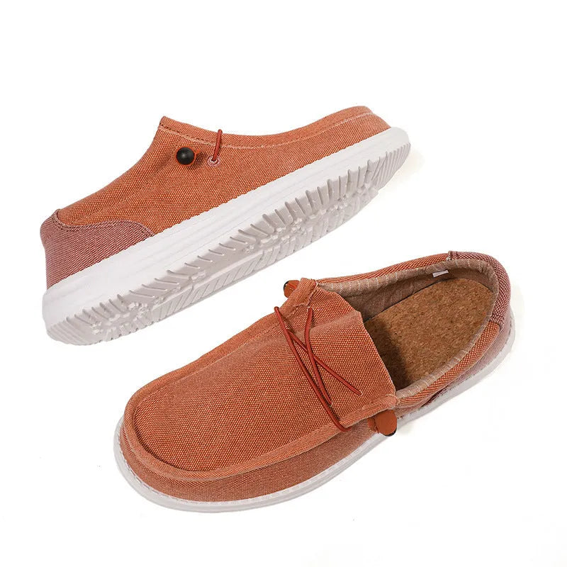 Men's green and orange canvas casual shoes with colourful mosaic panelling and rubber soles