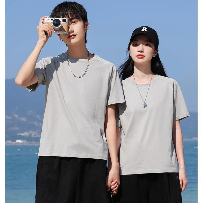 Men's pure cotton straight cut short sleeve t-shirt on a hanger, shown in multiple solid colour options.