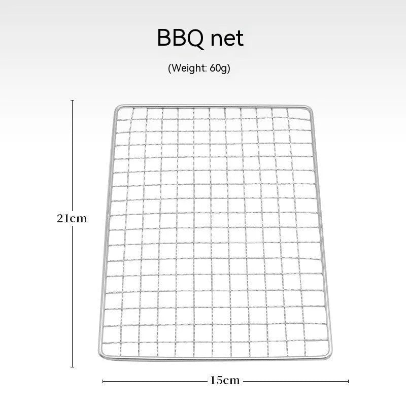 Large foldable stainless steel barbecue oven with storage bag, set up for outdoor use.