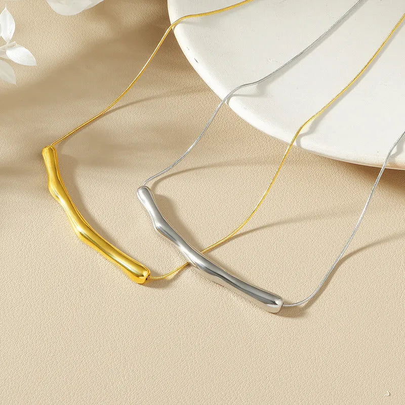 Women's titanium steel necklace with irregular pleated pendant in gold or steel electroplated finish