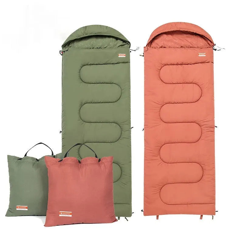 Ultra-light cotton camping sleeping bag quilt shown in ochre colour, folded to show quilted stitching.
