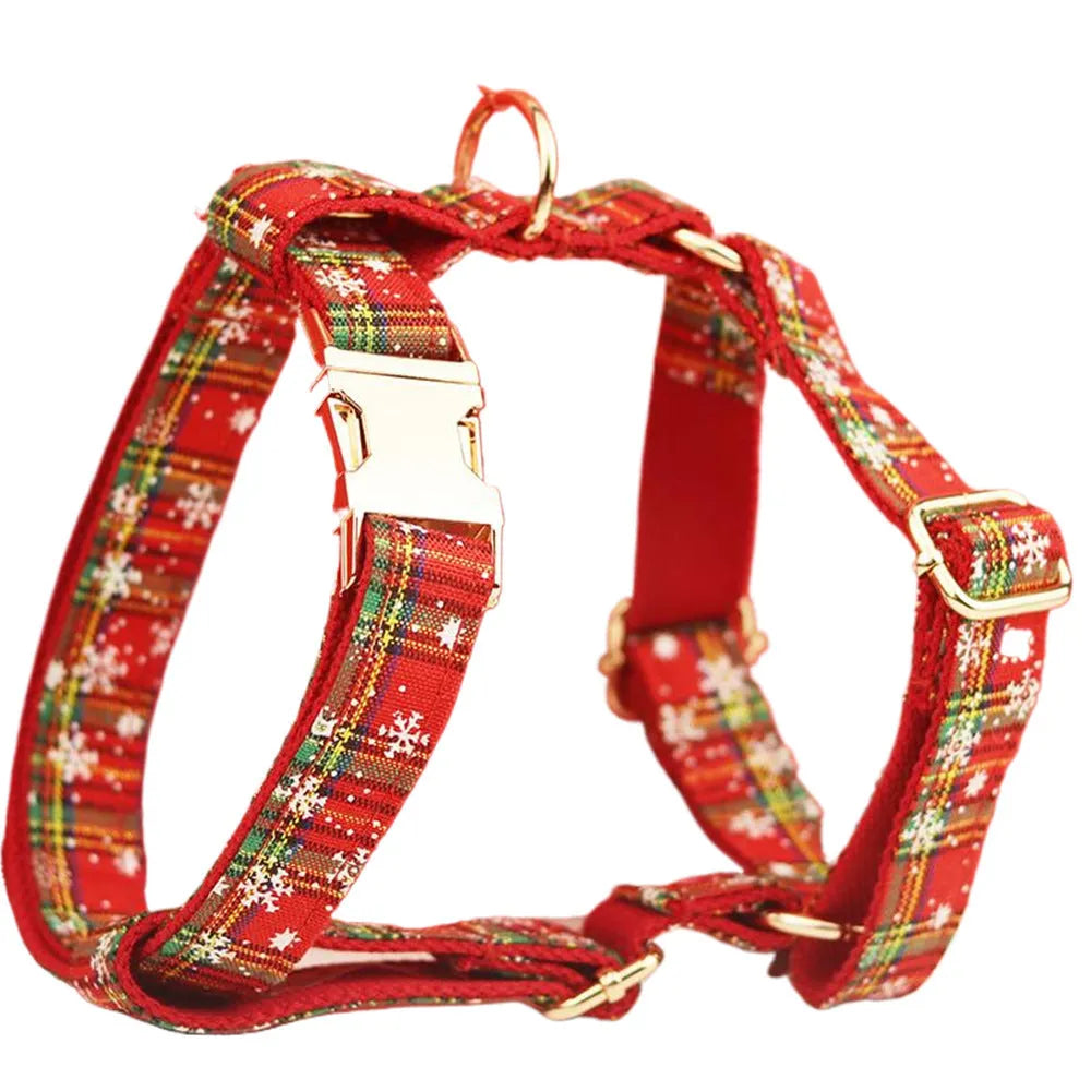 Red snowflake Christmas pet collar with plaid leash, bow, and vest four-piece holiday outfit set for dogs
