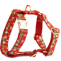 Red snowflake Christmas pet collar with plaid leash, bow, and vest four-piece holiday outfit set for dogs