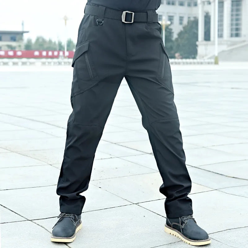 Men's camouflage stretch trousers in X9 khaki, loose fit, chemical fibre blend, outdoor wear