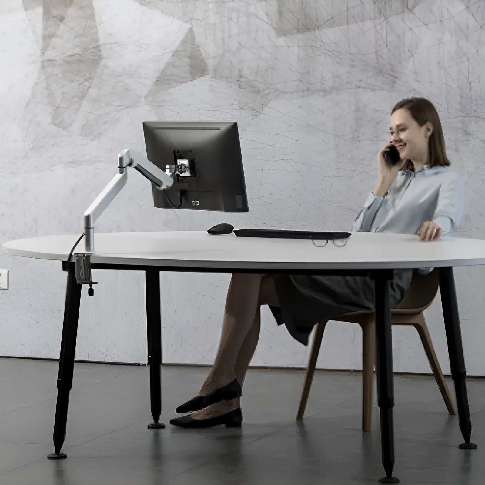 Silver aluminium laptop stand elevating notebook for improved airflow and ergonomic positioning