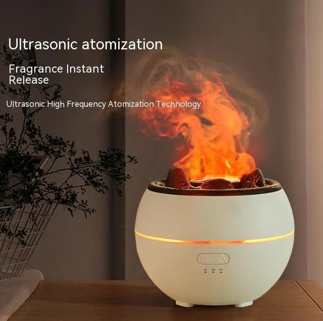 White round flame aroma diffuser humidifier with water tank and timer controls on a desk.