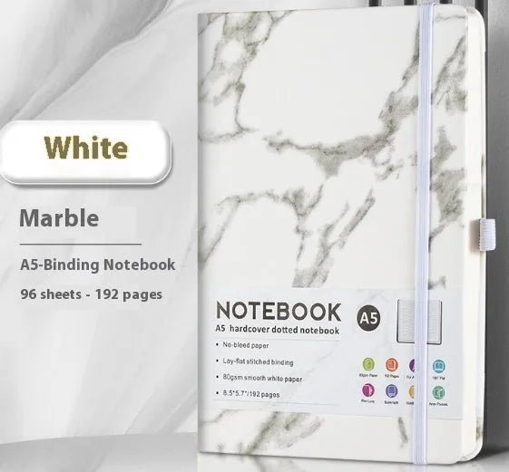 A5 diary with soft PU leather cover in a skin feeling texture, open to show horizontal line pages.