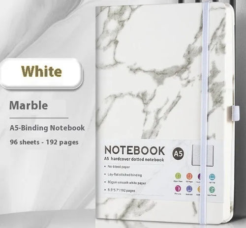 A5 diary with soft PU leather cover in a skin feeling texture, open to show horizontal line pages.