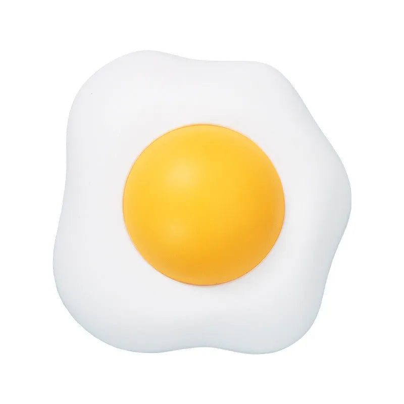 Catnip ball toy with suction cup attached to wall, showing Fried egg and Poached egg shape options