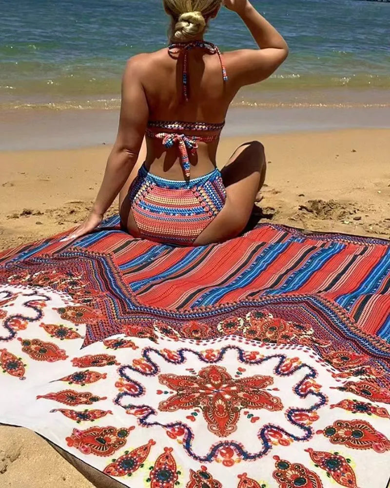 Ladies three-piece swimsuit set with high-waisted briefs, cutout blouse top, and a long coat.