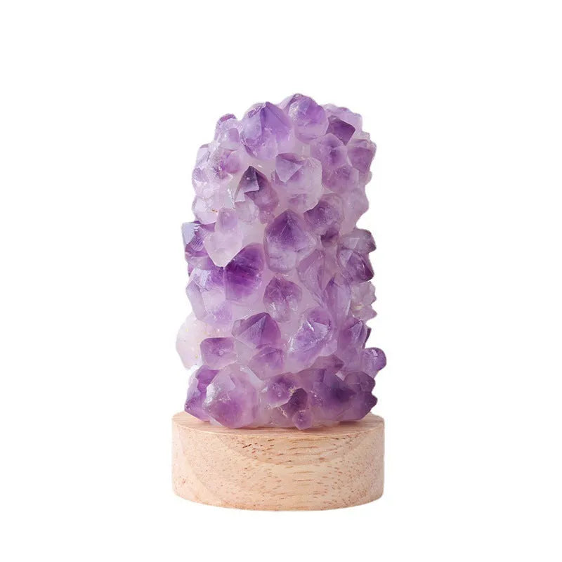 Natural amethyst crystal night light with USB plug showing both warm and cold light settings