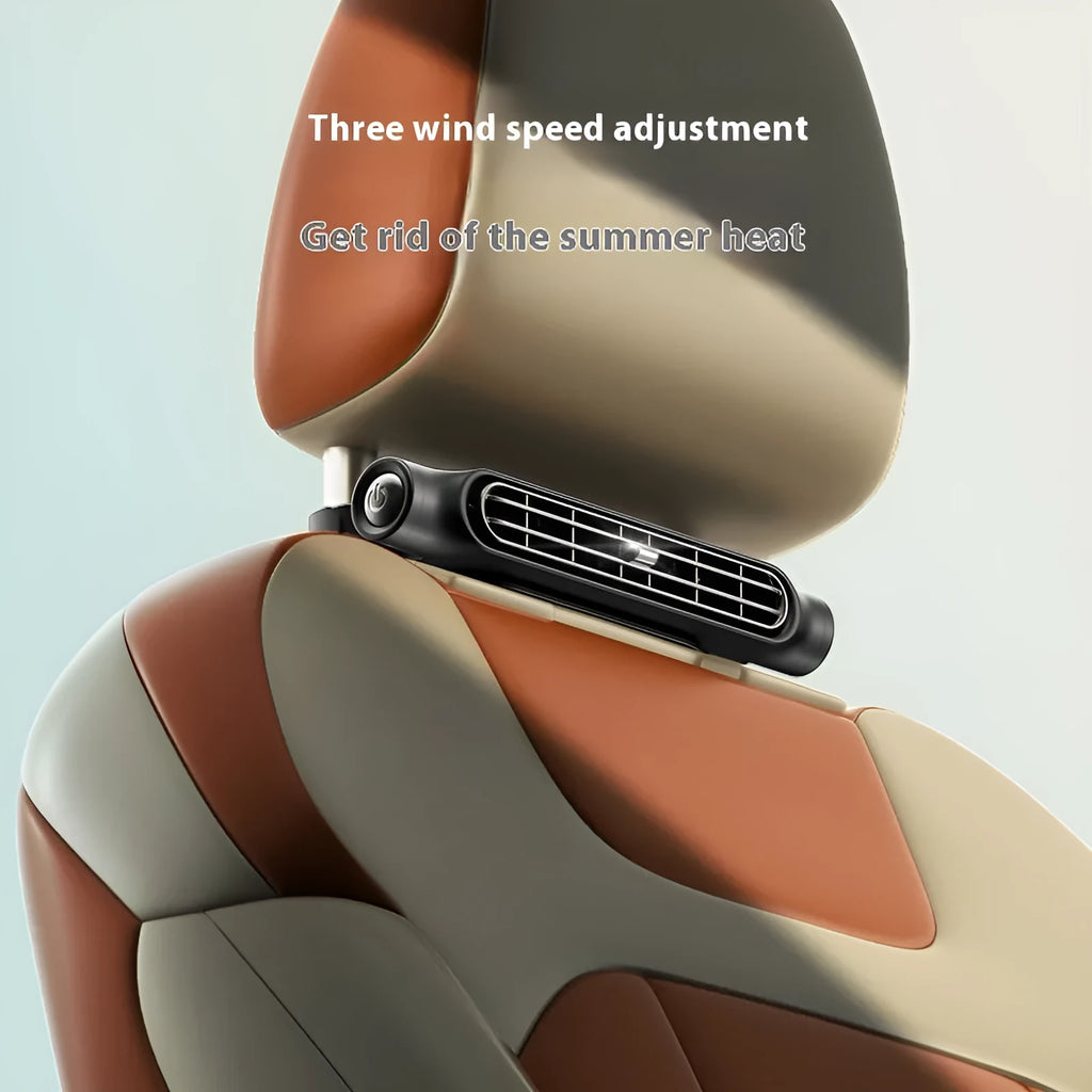 USB car fan with velcro strap mounted on a car seat headrest, showing its brushless motor and bladeless design.