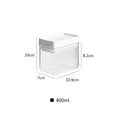 White and transparent 400ml plastic storage container for whole grains, 10.9 x 10 x 7 cm.