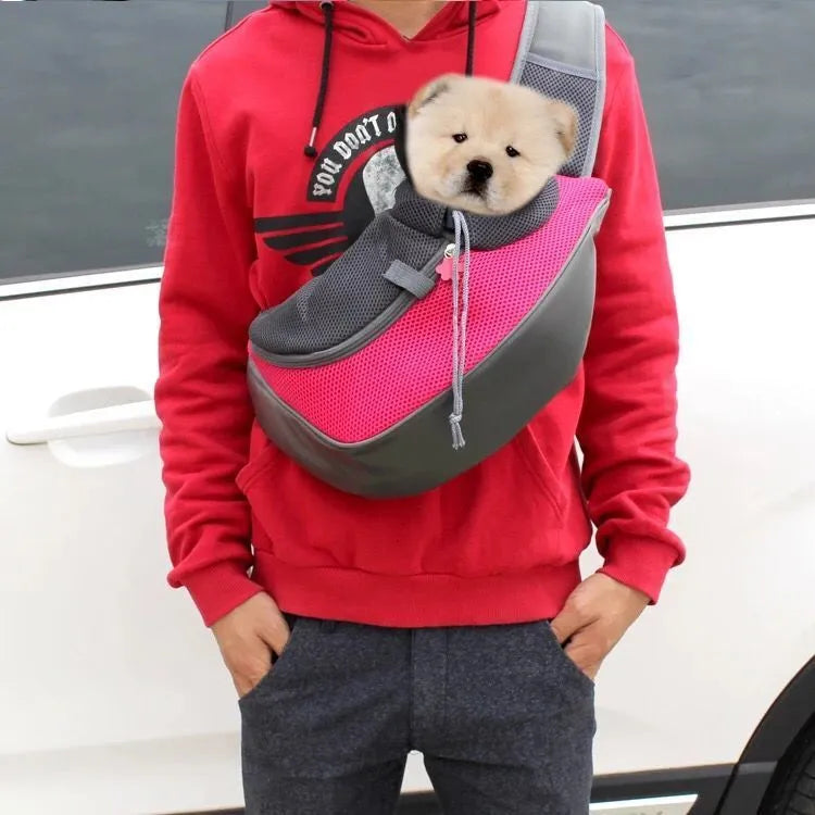 Mesh fabric pet carrier sling bag with single shoulder strap, shown in assorted colours.