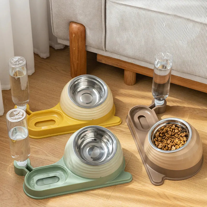 Raised cat feeder bowl with attached water bottle dispenser in green colour