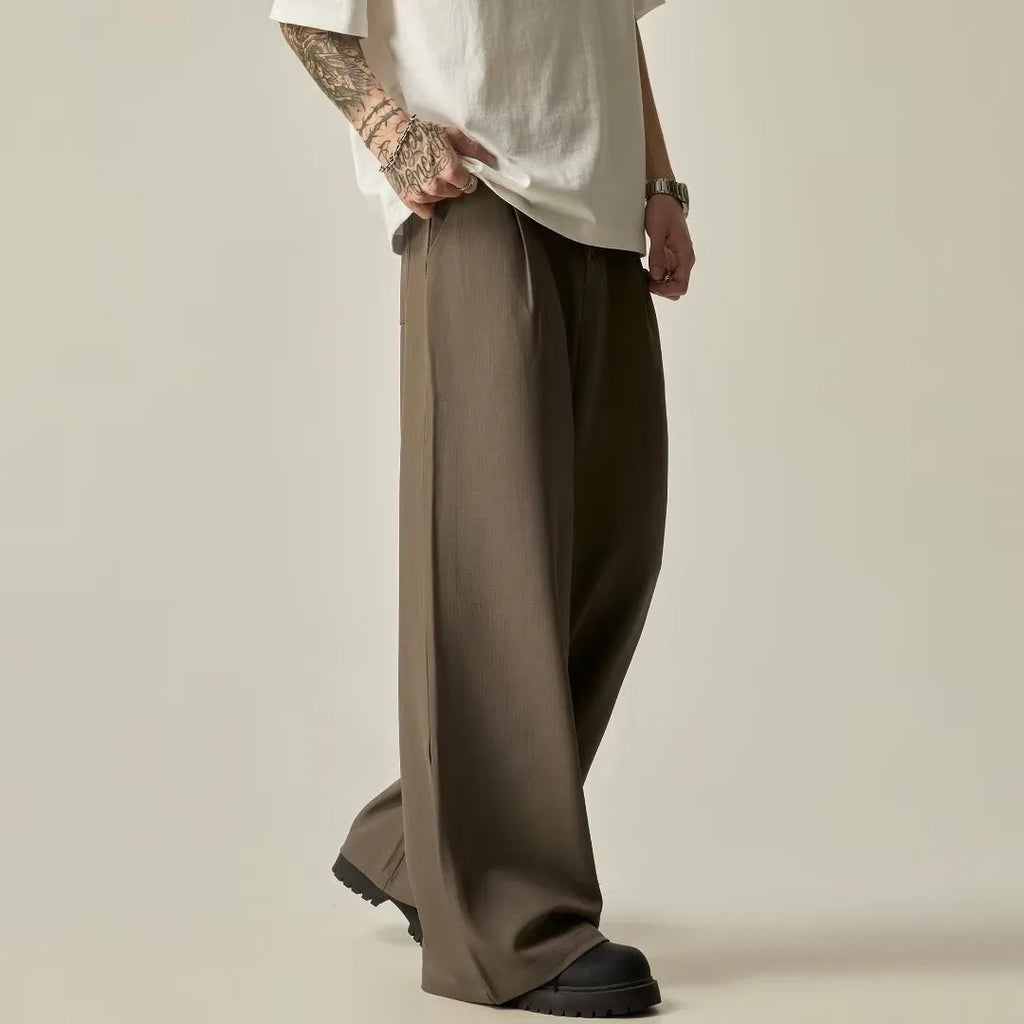 Men's black cotton blend straight-leg wide casual trousers with an elastic mid waist.