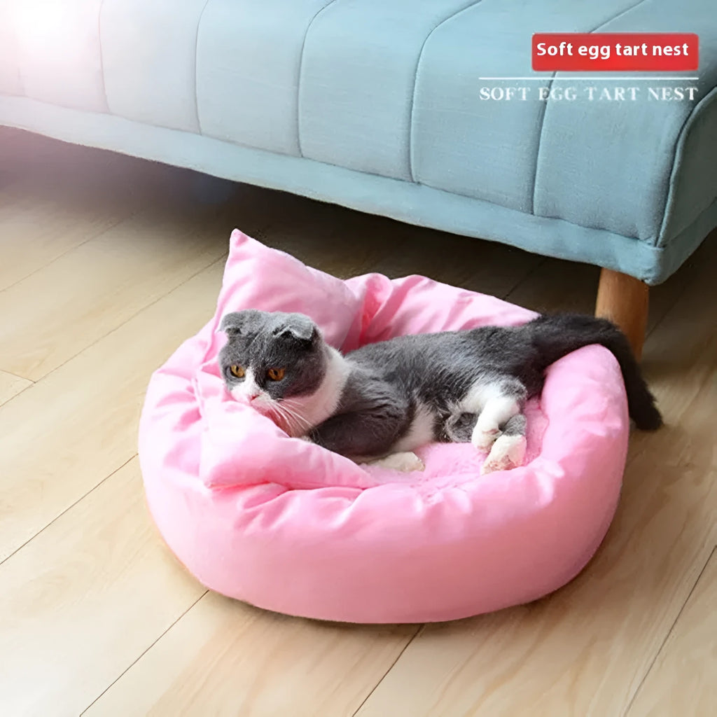 Circular light grey dog bed with PP cotton filling showing raised edges and optional pillow