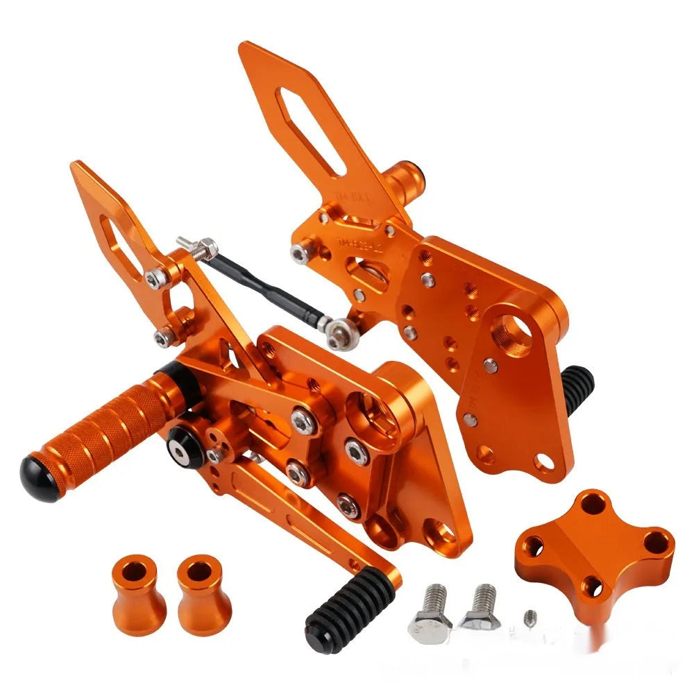 KTM Duke rear shift pedal support assembly bracket in black or orange for 125 200 250 390 models
