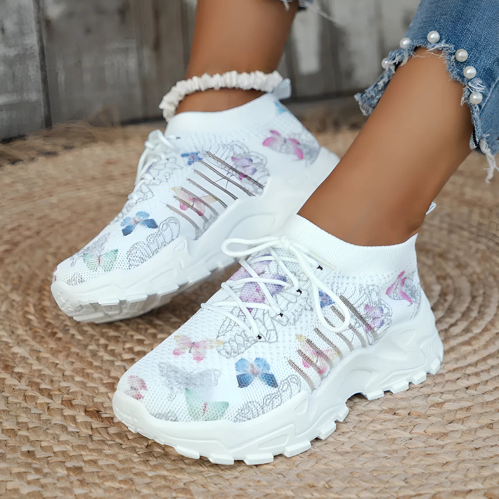 Butterfly print mesh sneakers for women in blue with flat heel, round toe, and front lace-up