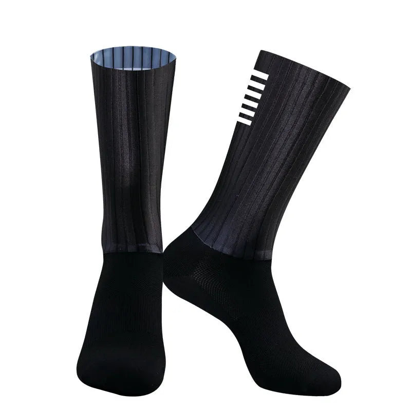 Pair of athletic socks for cycling and running in a chemical fibre blend, shown in one of six available colours.