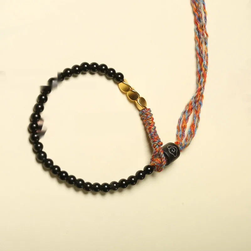 Obsidian coloured hand-woven carrying strap bracelet with 4mm width.