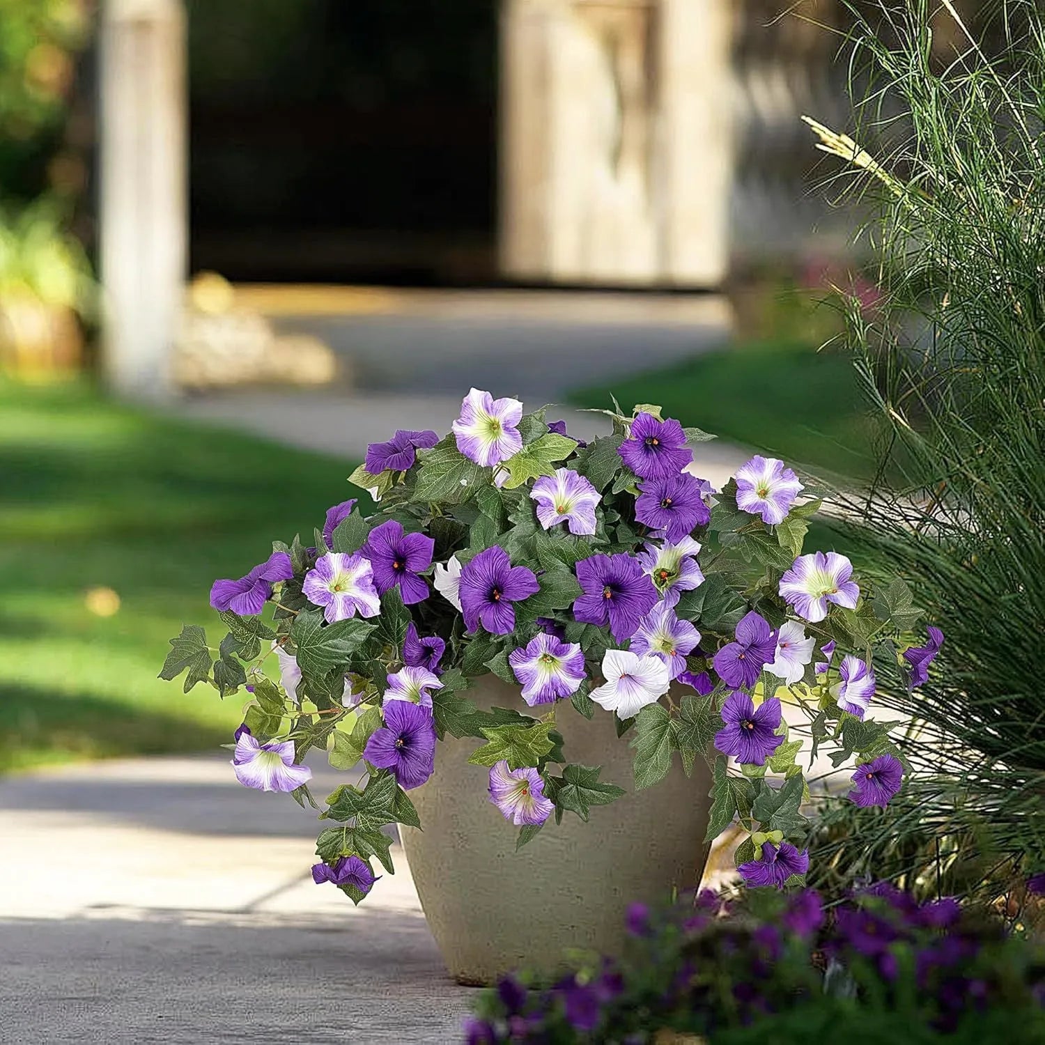 Plastic European courtyard artificial flower container with 12 fork branches and colourful silk flowers.