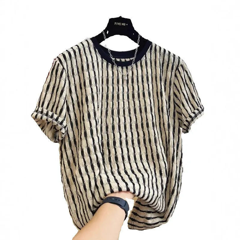 Black and white striped men's loose fit short sleeve pullover shirt made from linen silk blend fabric.