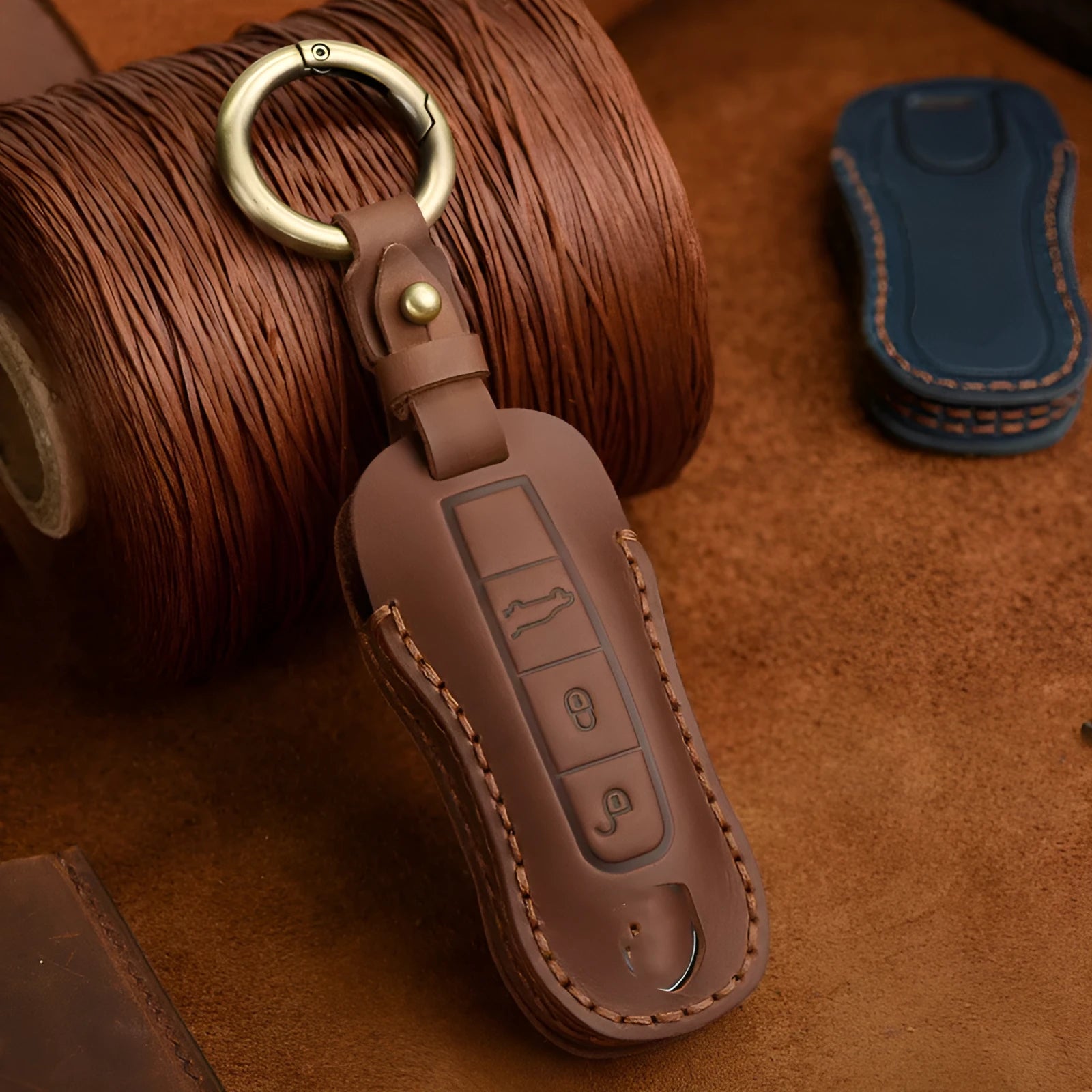 Genuine cowhide leather retro-style key cover for Porsche keys in blue or brown.